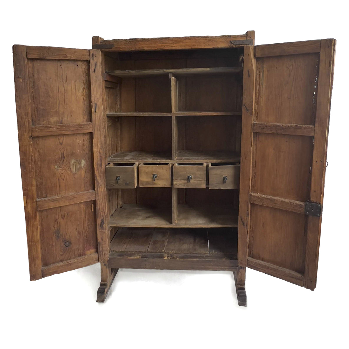 Argentine cedar cupboard with doors open, showing interior storage