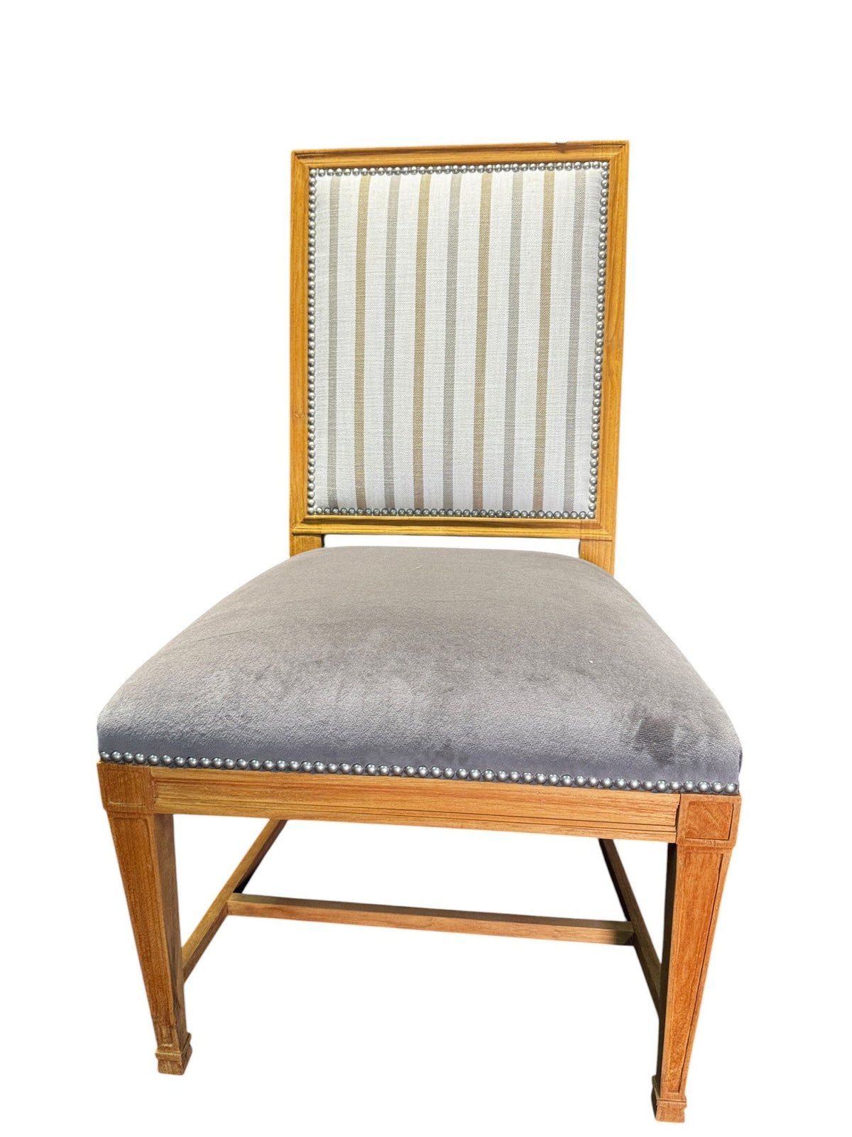 Individual chair showing striped upholstery, grey seat, nailhead trim and teak frame.