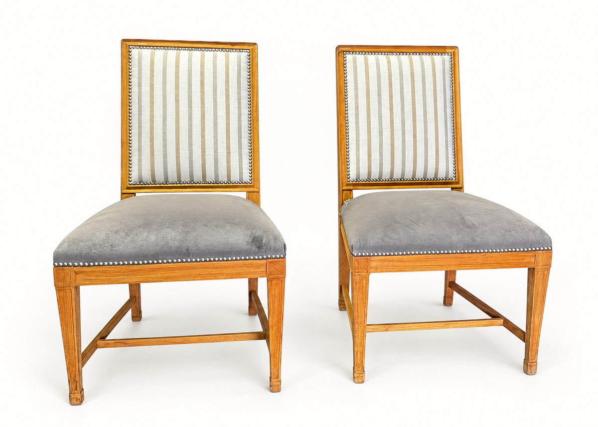 Two teak side chairs with striped upholstered backs and grey seats. Sold individually.