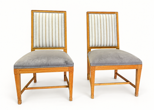 Two teak side chairs with striped upholstered backs and grey seats. Sold individually.